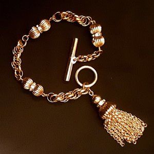 Goldtoned Charm Bracelet with Rhinestone Accents Signed TRIFARI